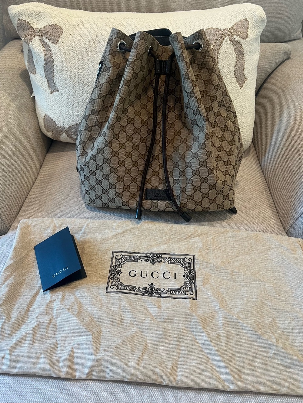 Authentic Gucci Drawstring Backpack With Adjustable Straps in GG Canvas